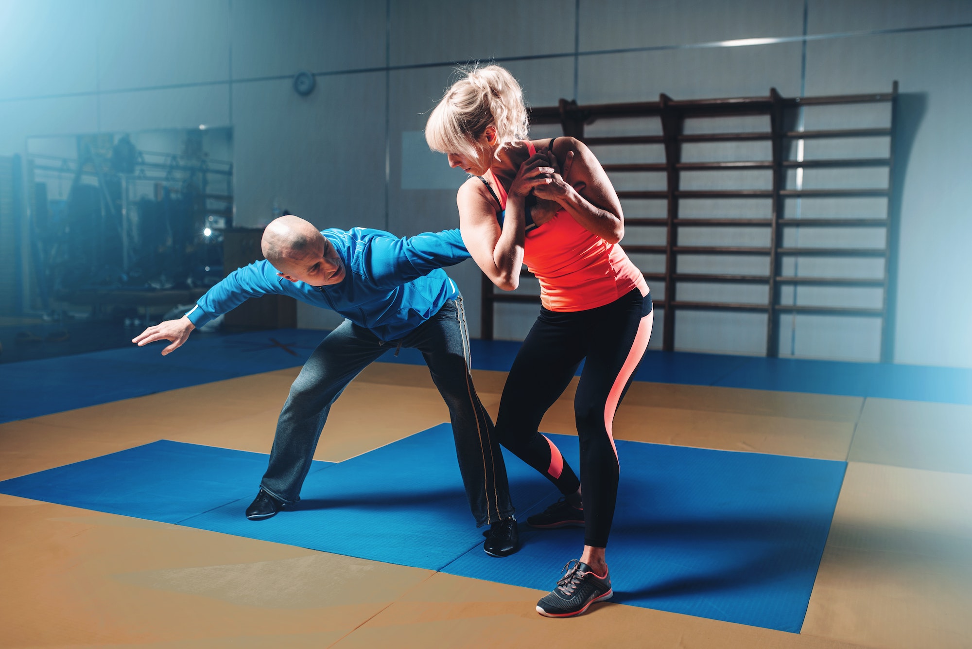 Woman in actoin on self-defense training