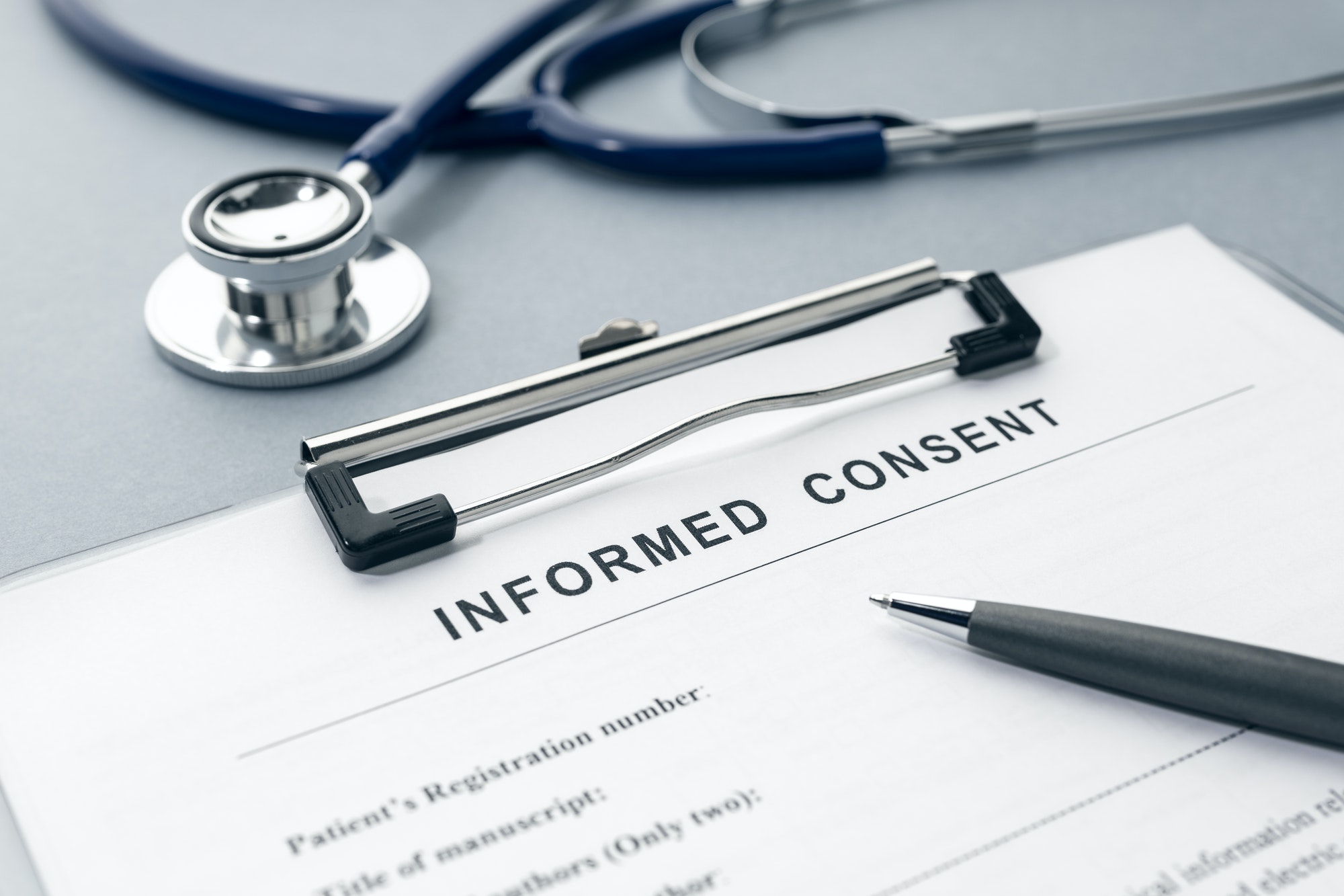 Informed Consent form on desk