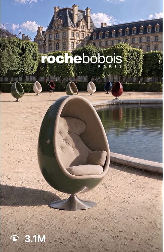 Fauteuil Ovalia Roche Bobois mis en scène en extérieur à Paris.